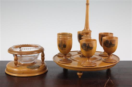 A Mauchline ware egg cruet stand & a stand with bowl